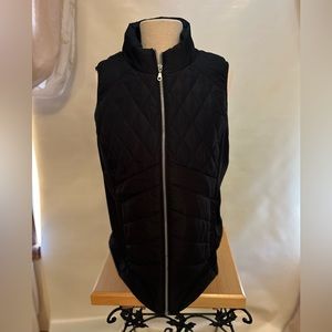 Black Maurices zip up puffer vest. Like new! Size XL